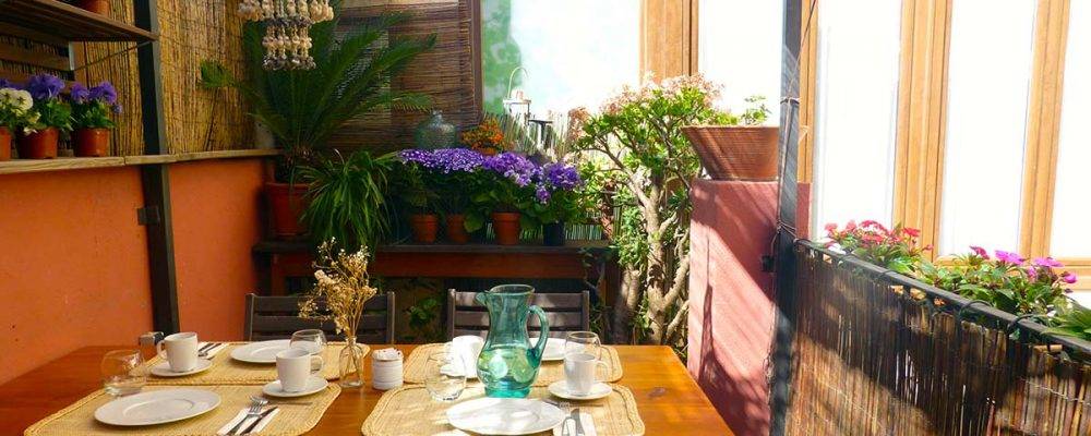 terrace and breakfst table hostal poblenou